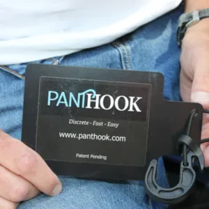 A person holding a black plastic card holder.